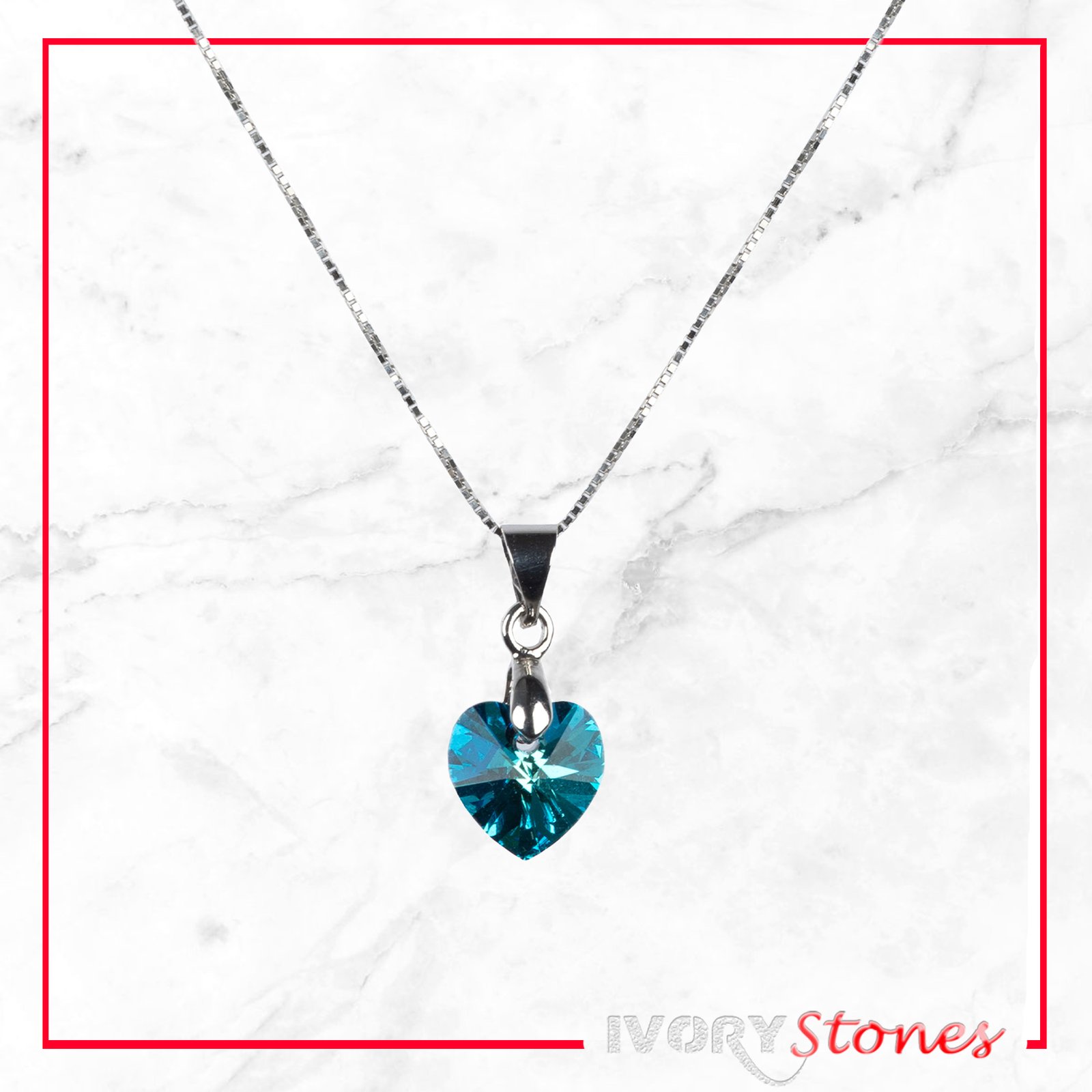 IvoryStone Crystal Small Heart Blue Wave Necklace. •